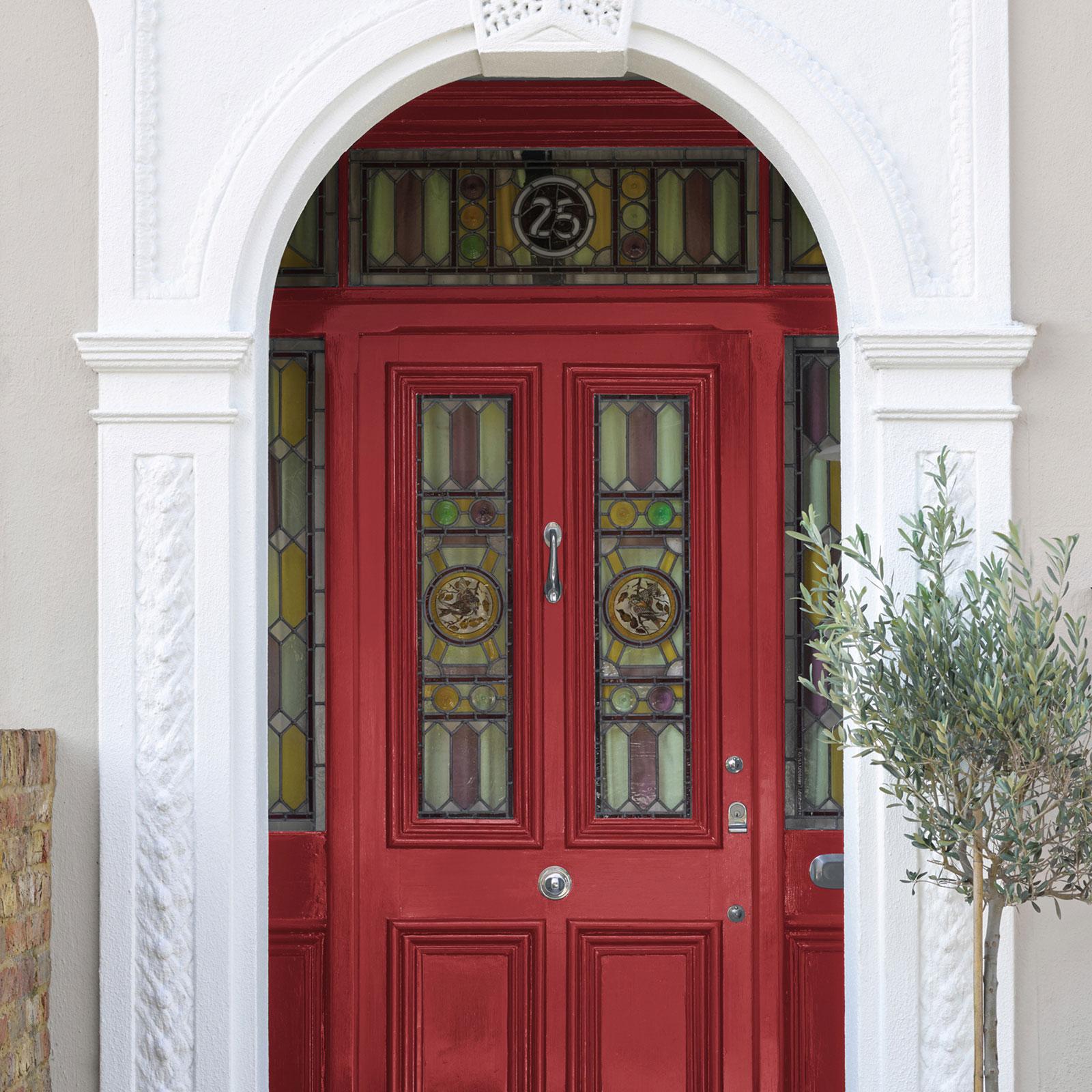 Photograph of a front door painted red.