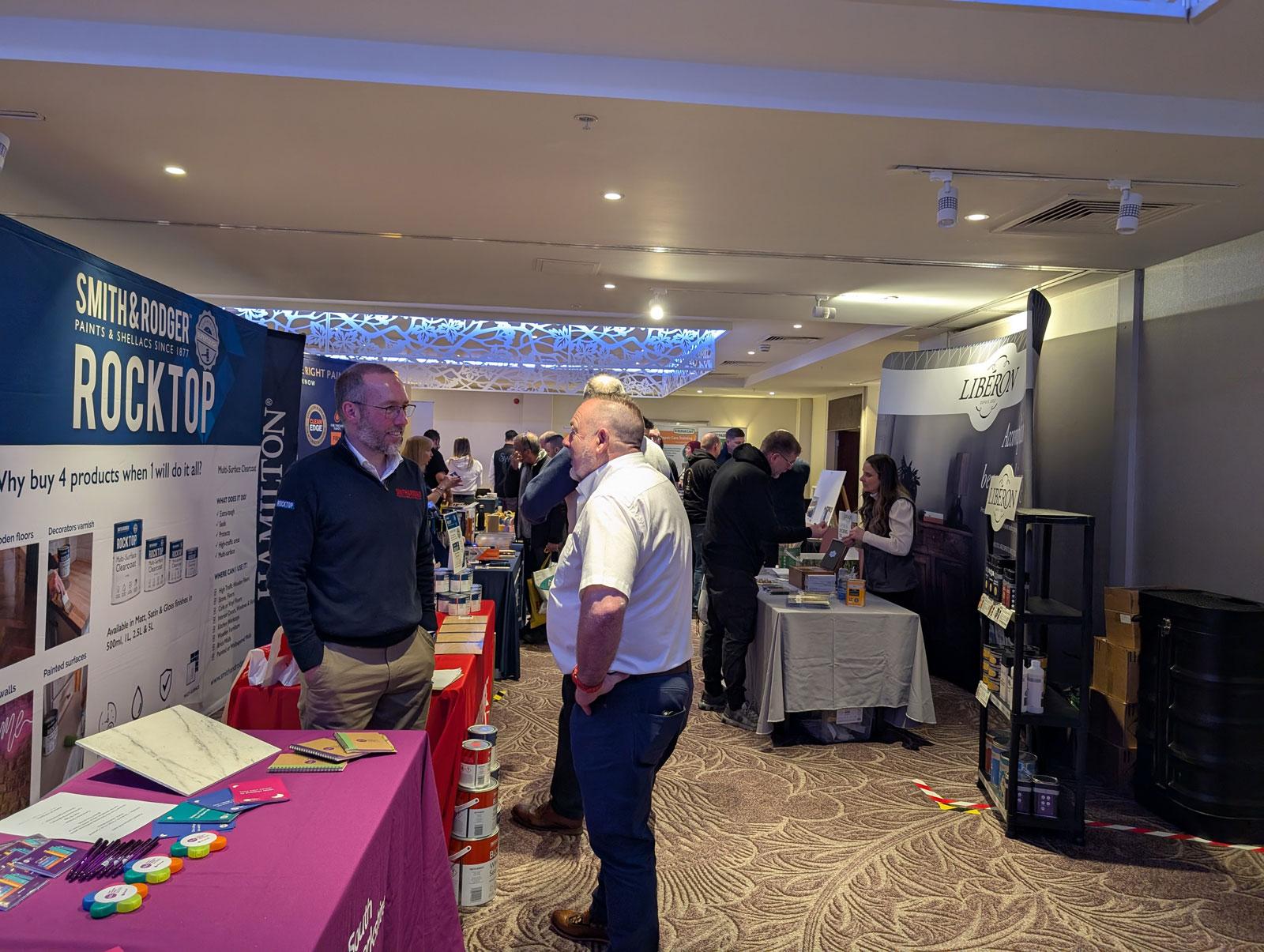 Photograph of exhibitors at the SDF 2025 show.