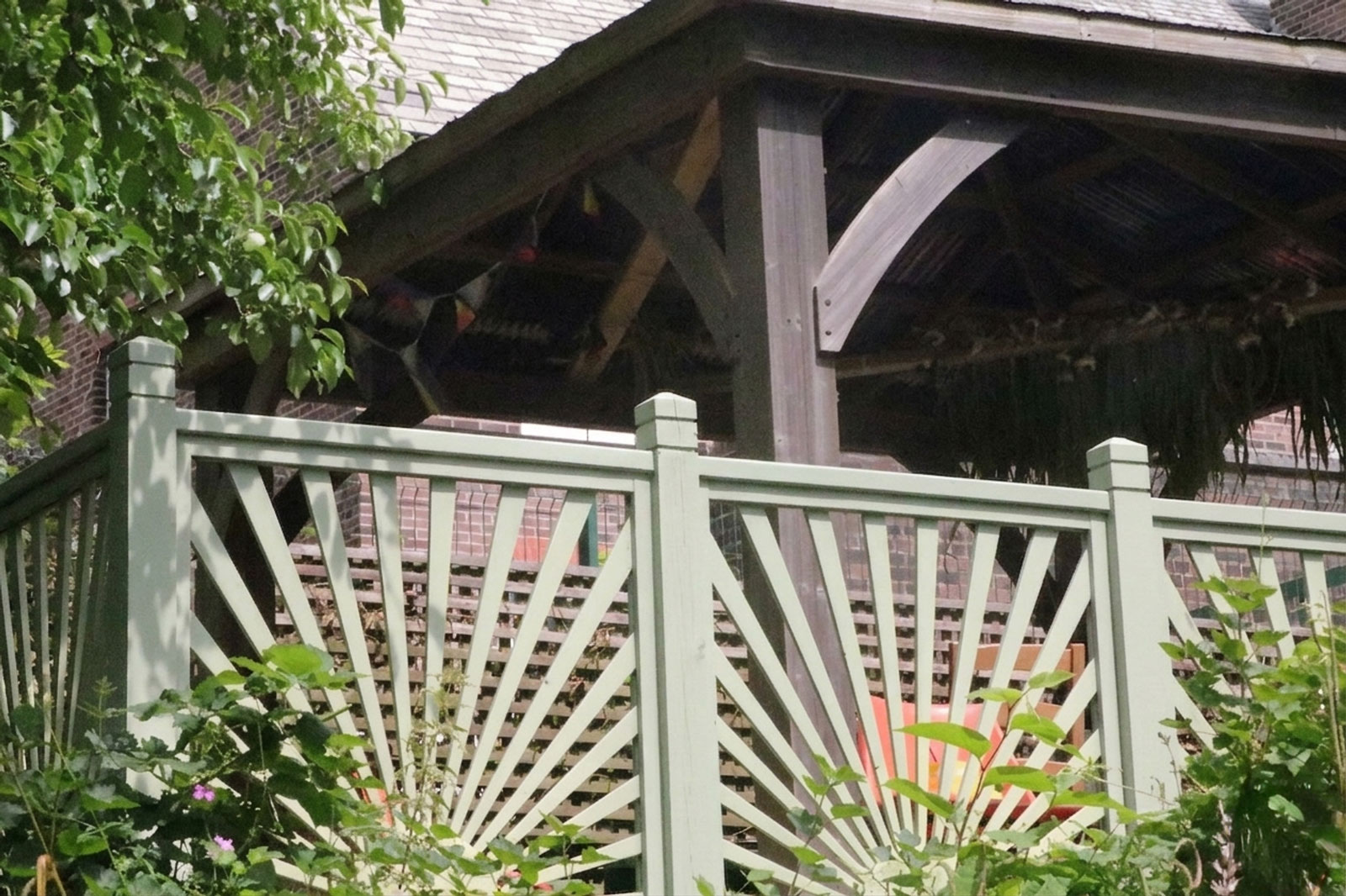 Photograph of garden fence painted using Chartwell green.